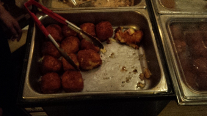 Croquettes filled with cheese and salty meat